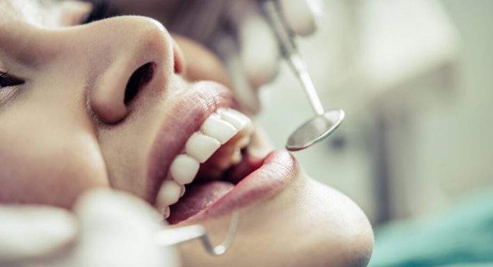 Dentists treat patients' teeth.