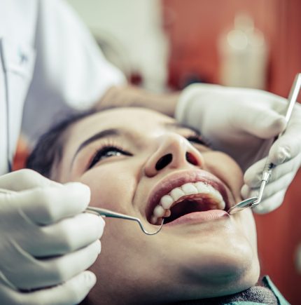 Dentists treat patients' teeth.